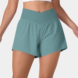 Breezeful High Waisted Crossover Side Pocket 2-in-1 Yoga Shorts 4"